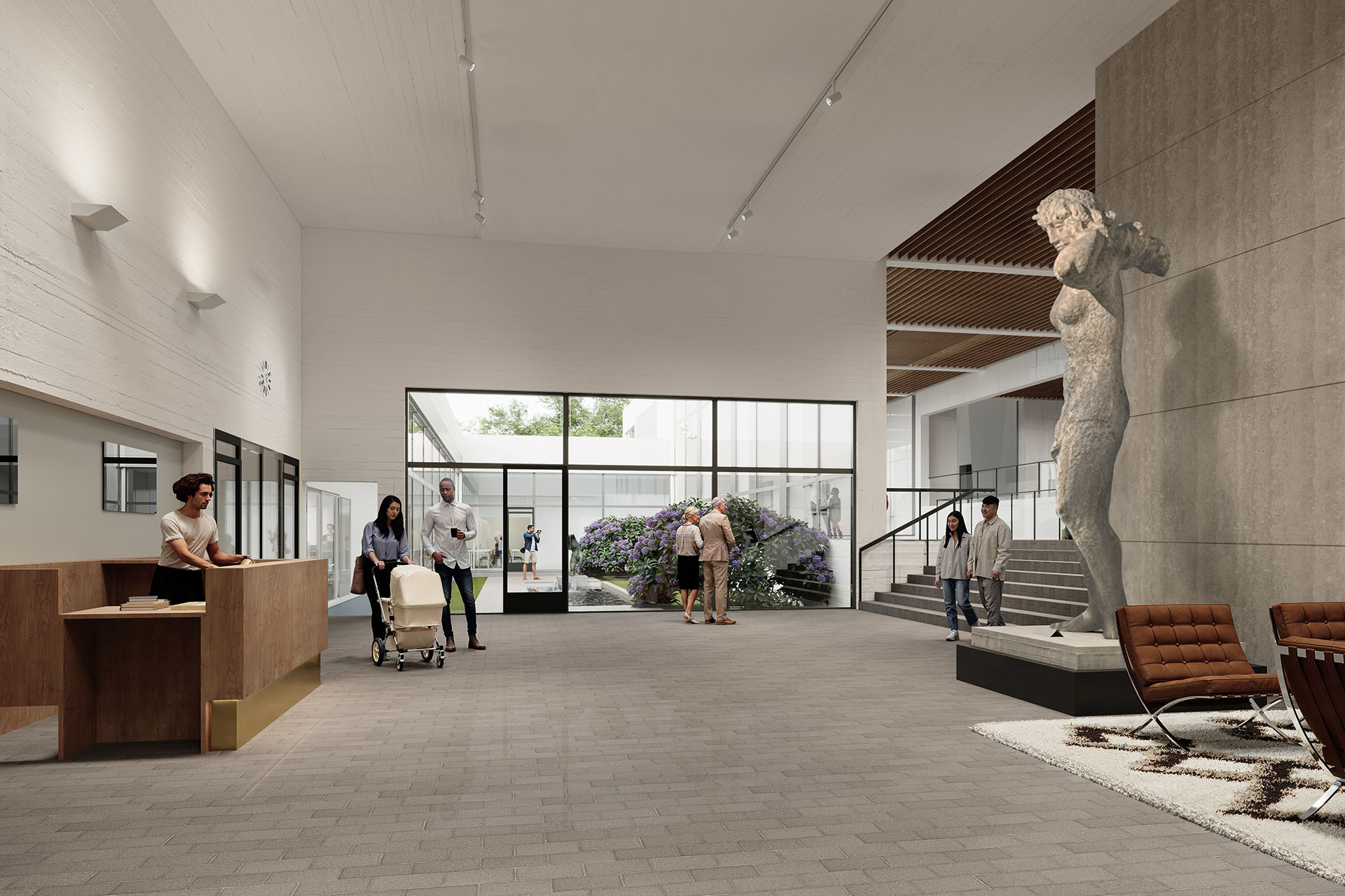 En ljus och öppen museilobby med människor som strövar omkring och trivs.